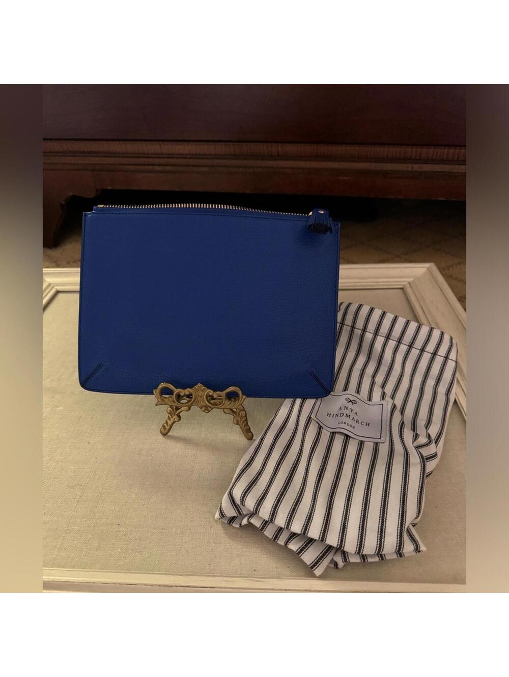 Anya Hindmarch leather royal blue clutch pouch with tassel zip close